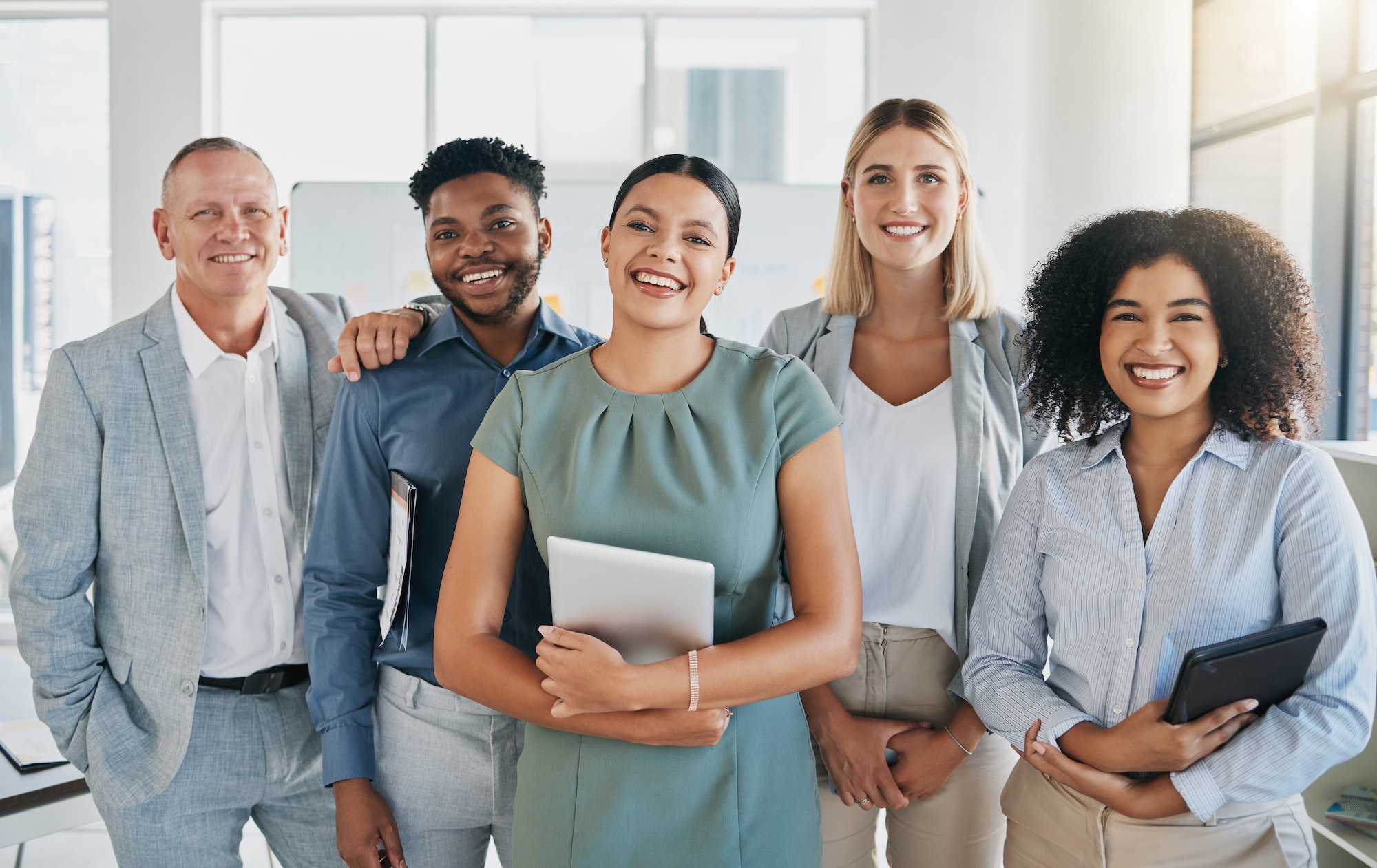 portrait happy or business people in a digital agency in an office building with motivation goals