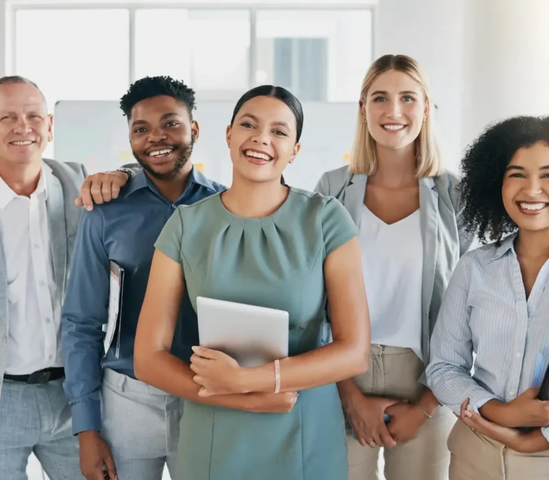 portrait-happy-or-business-people-in-a-digital-agency-in-an-office-building-with-motivation-goals.webp