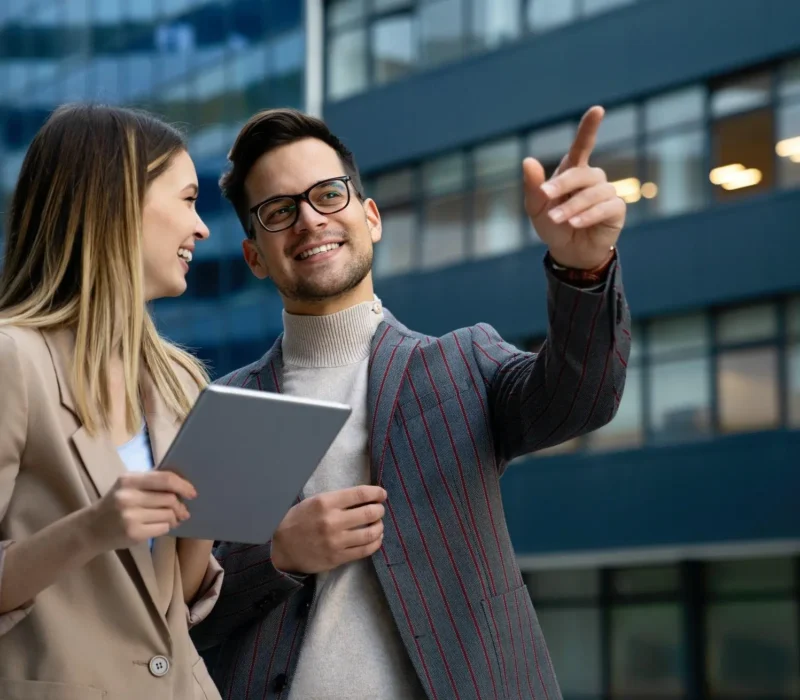 successful-business-colleagues-people-working-together-on-digital-devices.webp